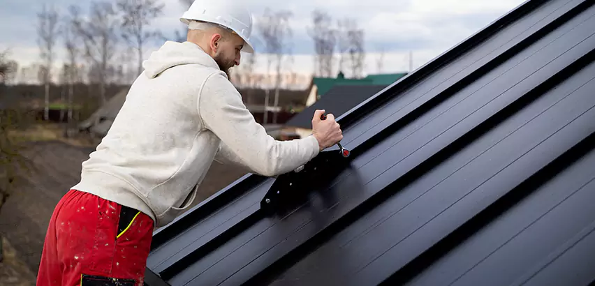 Tin Roof Ridge Cap Installation in Lockport